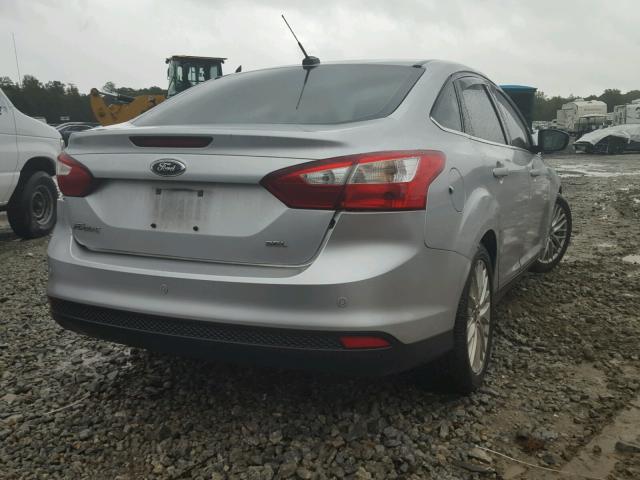 1FAHP3H24CL276468 - 2012 FORD FOCUS SEL BLACK photo 4