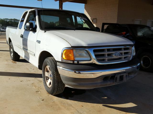 2FTRX17274CA25220 - 2004 FORD F-150 HERI WHITE photo 1