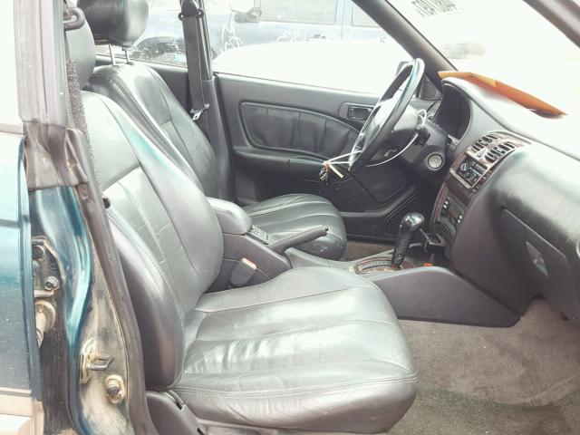 4S3BG6857X7646080 - 1999 SUBARU LEGACY GREEN photo 5