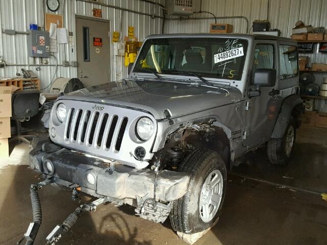 1C4AJWAG2GL212309 - 2016 JEEP WRANGLER S SILVER photo 2