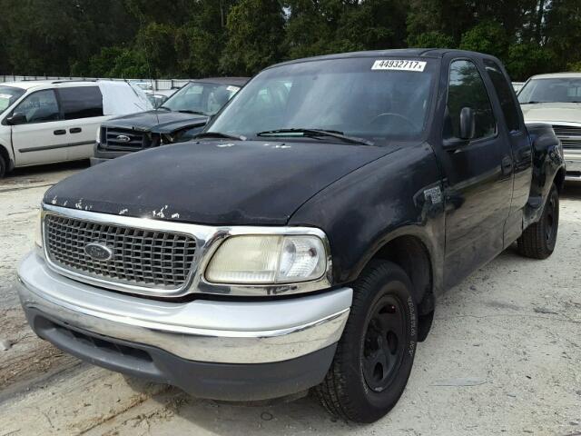 2FTRX07W9YCA27022 - 2000 FORD F150 BLACK photo 2