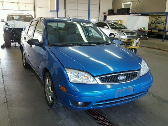 1FAHP34N07W212576 - 2007 FORD FOCUS BLUE photo 1