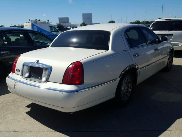 1LNHM82W1XY671207 - 1999 LINCOLN TOWN CAR WHITE photo 4