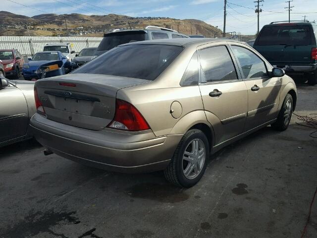 1FAFP34P33W190219 - 2003 FORD FOCUS GOLD photo 4