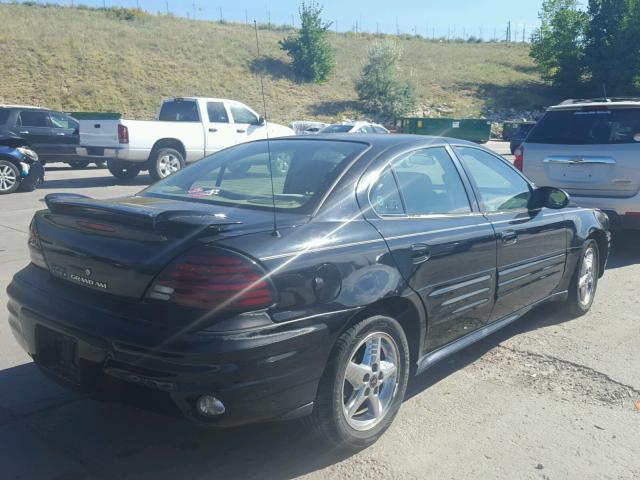 1G2NF52E32C263289 - 2002 PONTIAC GRAND AM S BLACK photo 4