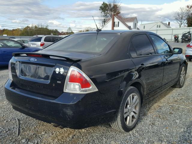 3FAHP07Z27R248642 - 2007 FORD FUSION SE BLACK photo 4