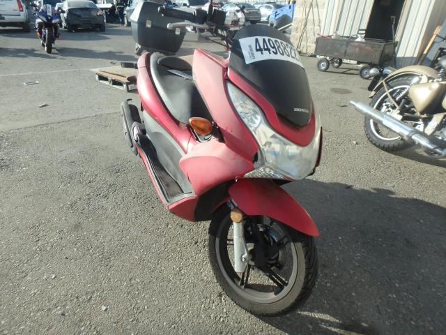 MLHJF2806B5002700 - 2011 HONDA PCX RED photo 1