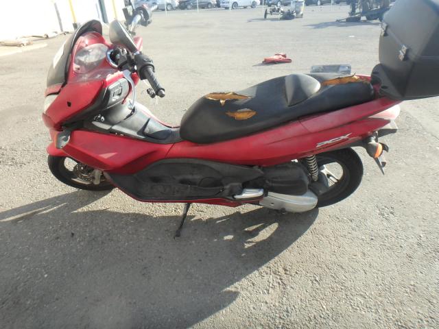 MLHJF2806B5002700 - 2011 HONDA PCX RED photo 10