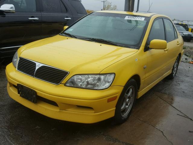 JA3AJ86E13U121313 - 2003 MITSUBISHI LANCER OZ YELLOW photo 2