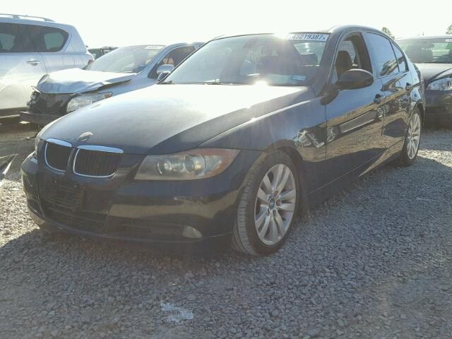 WBAVA37557NE27869 - 2007 BMW 328 I BLACK photo 2