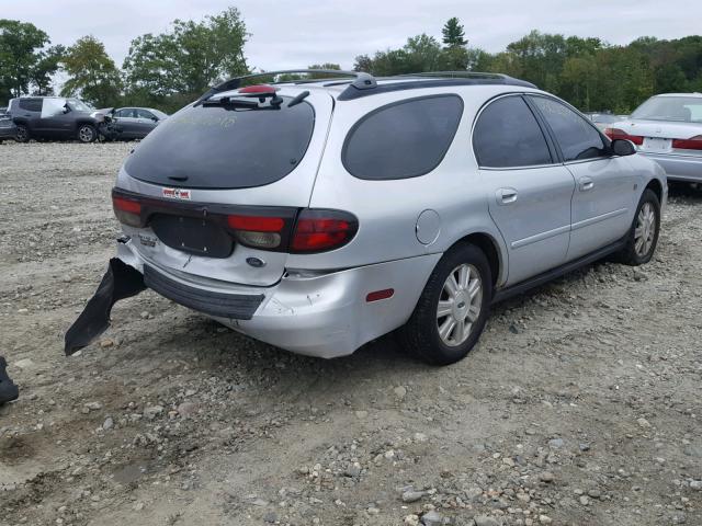 1FAHP59S74A174881 - 2004 FORD TAURUS SEL GRAY photo 4