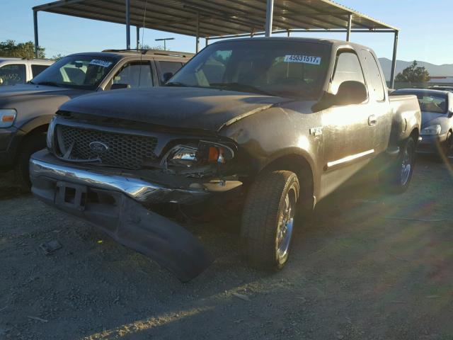 1FTZX07271KA27289 - 2001 FORD F150 BLACK photo 2