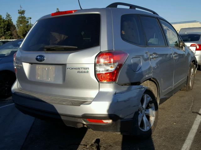 JF2SJAEC1EH519986 - 2014 SUBARU FORESTER 2 SILVER photo 4