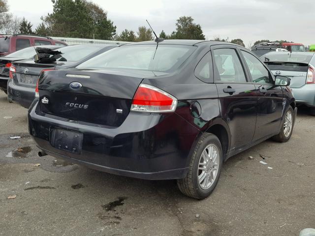 1FAHP35NX8W230308 - 2008 FORD FOCUS BLACK photo 4