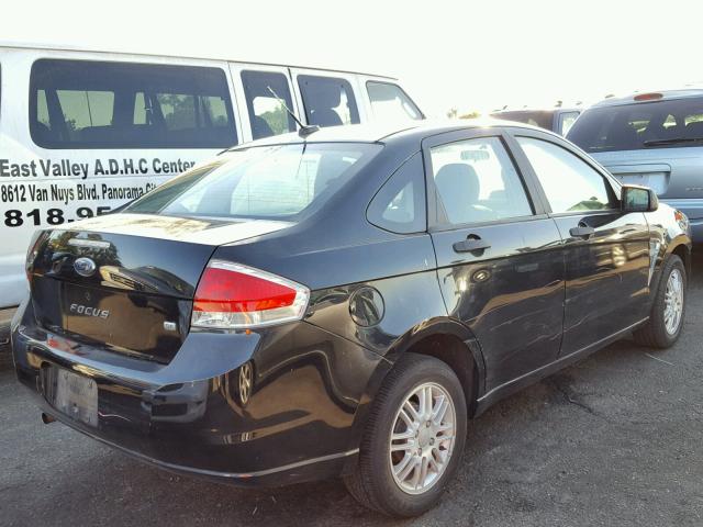 1FAHP35N68W116113 - 2008 FORD FOCUS BLACK photo 4