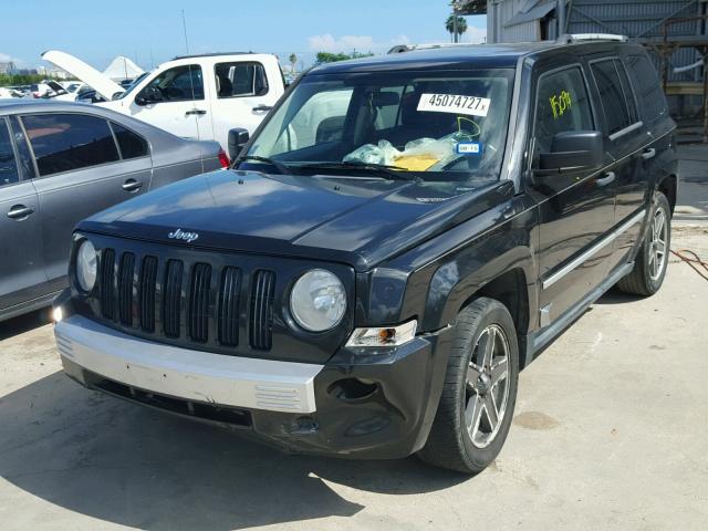 1J4FT48B09D154769 - 2009 JEEP PATRIOT LI BLACK photo 2