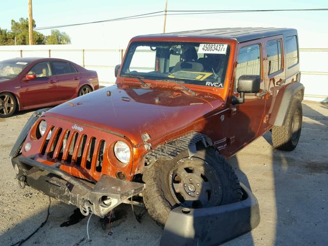 1C4BJWDG9EL250696 - 2014 JEEP WRANGLER U ORANGE photo 2