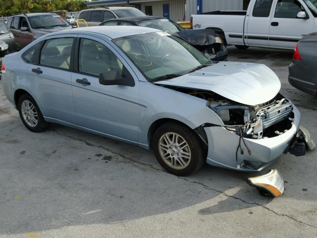 1FAHP35NX9W257591 - 2009 FORD FOCUS BLUE photo 1