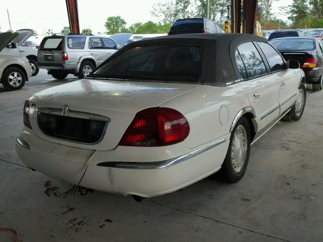 1LNFM97V5WY604704 - 1998 LINCOLN CONTINENTA WHITE photo 4