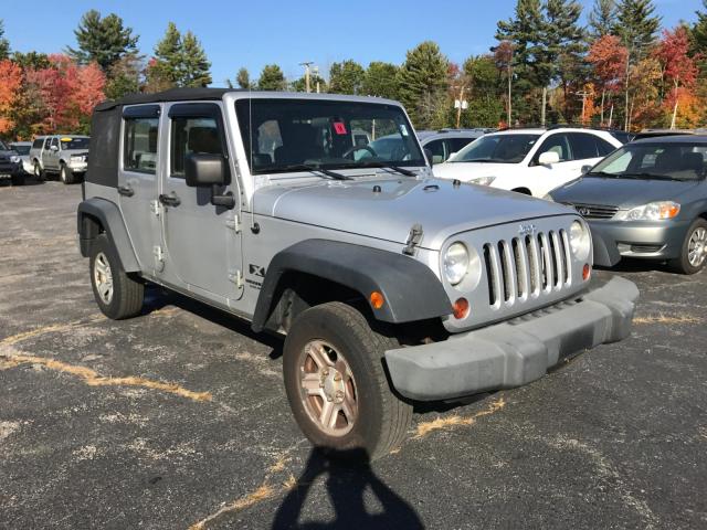 1J4GA39149L759703 - 2009 JEEP WRANGLER U SILVER photo 1