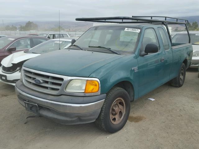 2FTRX17W94CA55998 - 2004 FORD F-150 HERI TEAL photo 2