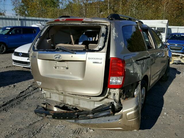 KNDMC233486050399 - 2008 HYUNDAI ENTOURAGE GOLD photo 4