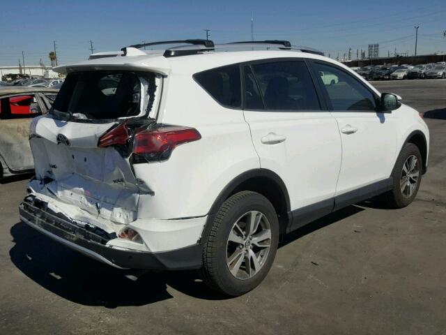 JTMWFREV2GJ073943 - 2016 TOYOTA RAV4 XLE WHITE photo 4