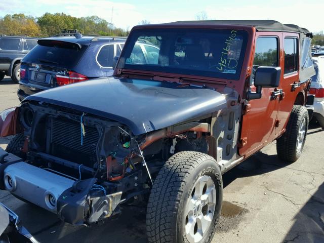 1C4HJWEG9EL164636 - 2014 JEEP WRANGLER U ORANGE photo 2