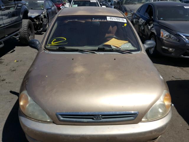 KNADC123226191990 - 2002 KIA RIO GOLD photo 9