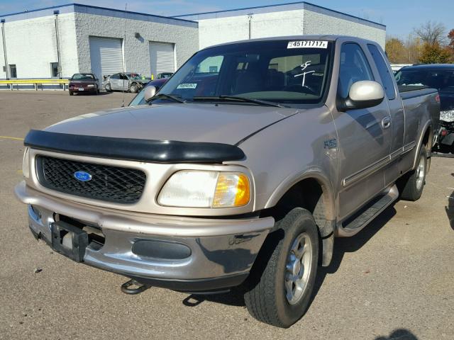 1FTDX18WXVKD05223 - 1997 FORD F150 TAN photo 2