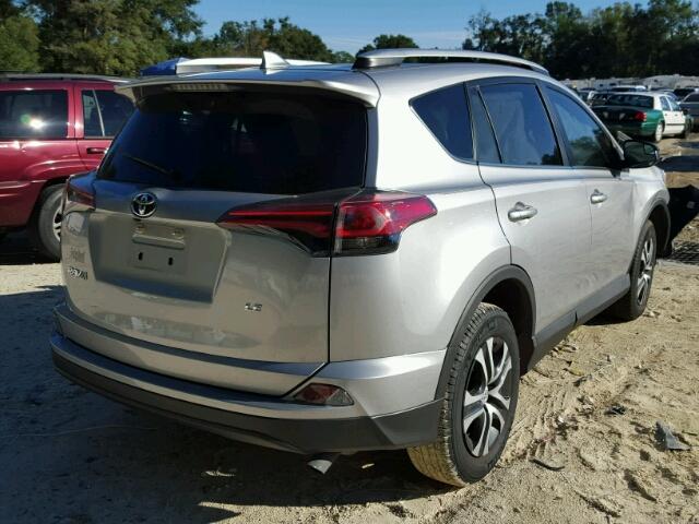 2T3ZFREV0GW258944 - 2016 TOYOTA RAV4 LE SILVER photo 4