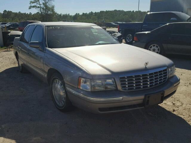 1G6KD54YXVU257146 - 1997 CADILLAC DEVILLE GOLD photo 1