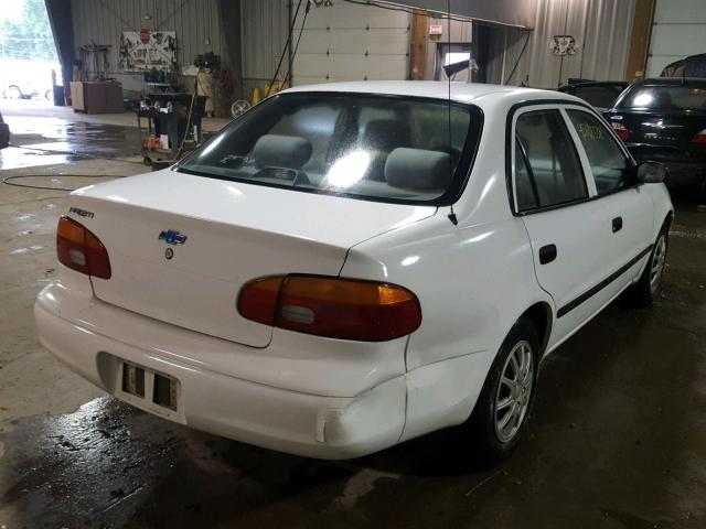 1Y1SK5285XZ446052 - 1999 CHEVROLET GEO PRIZM WHITE photo 4