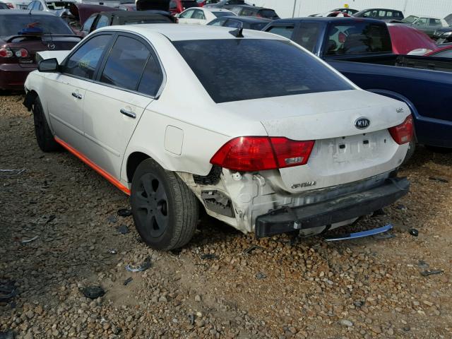 KNAGE228X95317425 - 2009 KIA OPTIMA LX WHITE photo 9