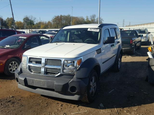 1D8GU28K57W560819 - 2007 DODGE NITRO SXT WHITE photo 2