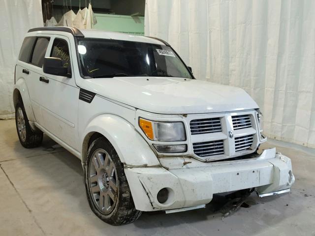 1D4PU4GXXBW607443 - 2011 DODGE NITRO HEAT WHITE photo 1