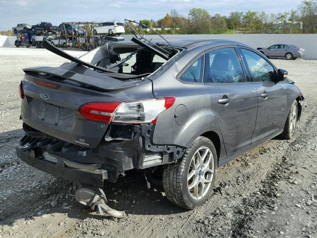 1FADP3F2XFL200940 - 2015 FORD FOCUS SE GRAY photo 4