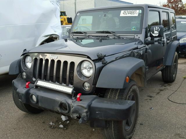 1C4BJWDG0GL279345 - 2016 JEEP WRANGLER U GRAY photo 2