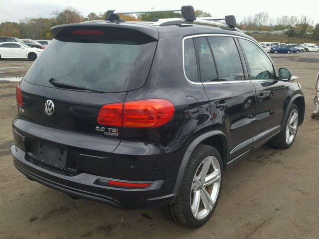 WVGBV7AX8FW086772 - 2015 VOLKSWAGEN TIGUAN S BLACK photo 4