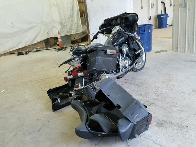 1HD1FC4187Y678755 - 2007 HARLEY-DAVIDSON FLHTCUI BLACK photo 4