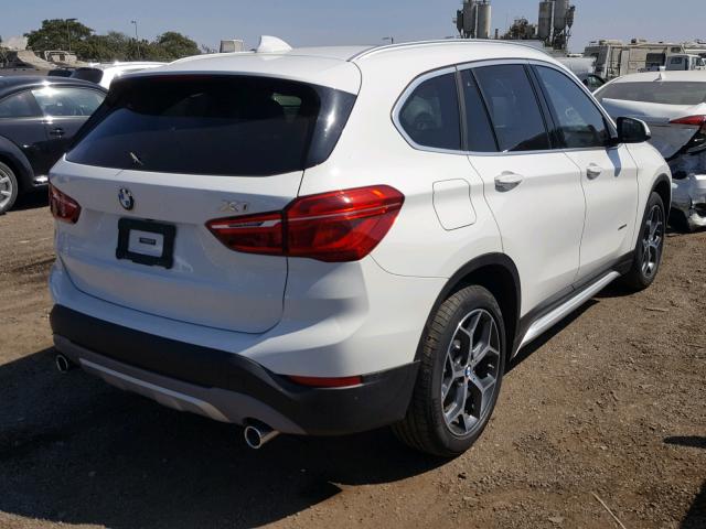 WBXHU7C33J5H39587 - 2018 BMW X1 SDRIVE2 WHITE photo 4