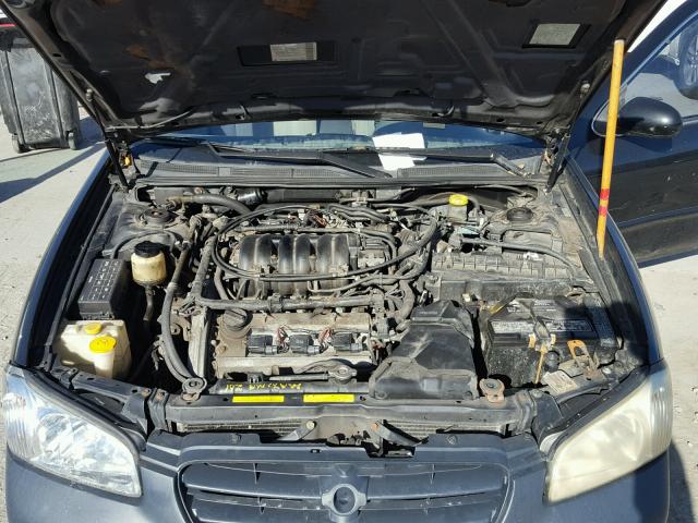 JN1CA31D4YT710237 - 2000 NISSAN MAXIMA GLE BLACK photo 7