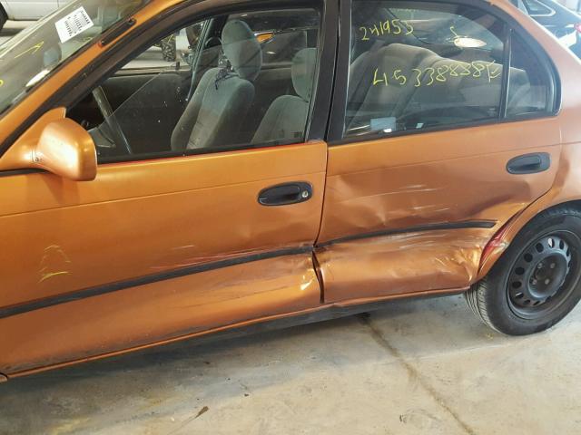 1NXBB02EXVZ521377 - 1997 TOYOTA COROLLA DX ORANGE photo 9