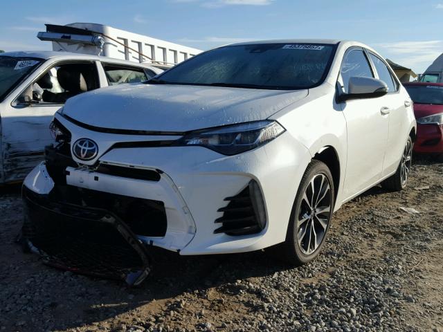 5YFBURHE9HP689281 - 2017 TOYOTA COROLLA L WHITE photo 2