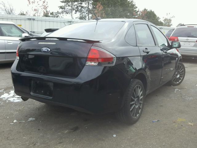 1FAHP3GN8AW135426 - 2010 FORD FOCUS BLACK photo 4