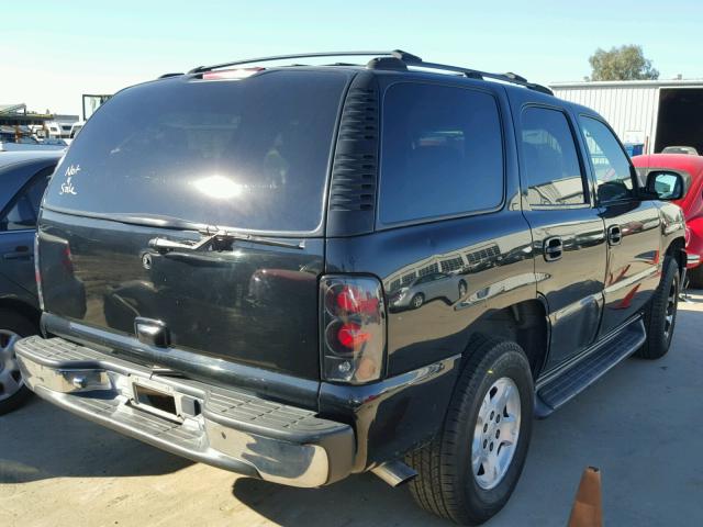 1GNEC13TX2R139387 - 2002 CHEVROLET TAHOE BLACK photo 4