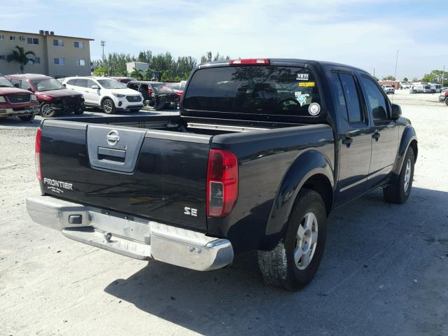 1N6AD07U66C467672 - 2006 NISSAN FRONTIER BLACK photo 4