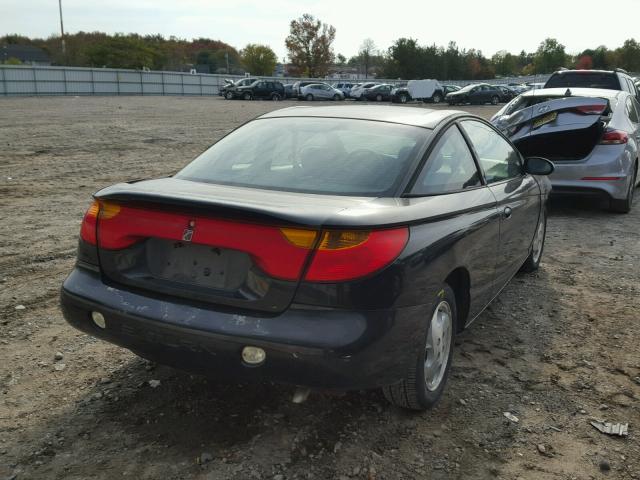 1G8ZY12742Z271975 - 2002 SATURN SC2 BLACK photo 4