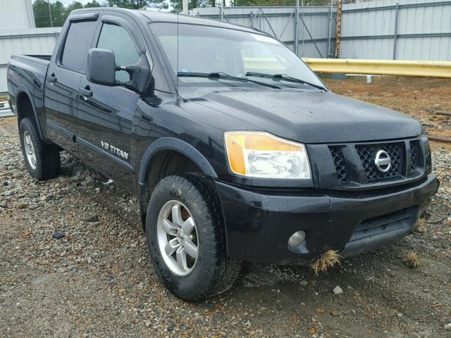 1N6BA0EC7AN304923 - 2010 NISSAN TITAN BLACK photo 1