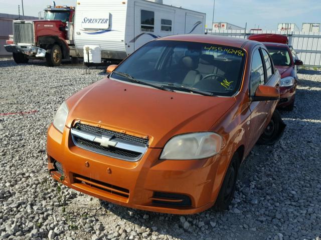 KL1TD56658B065038 - 2008 CHEVROLET AVEO BASE Pomarańczowy zdjęcie 2